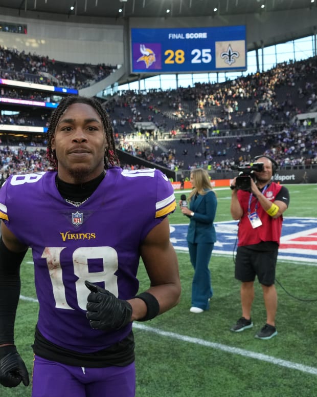 Oct 2, 2022; London, United Kingdom; Minnesota Vikings wide receiver Justin Jefferson (18) celebrates at the end of the game against the New Orleans Saints during an NFL International Series game at Tottenham Hotspur Stadium. The Vikings defeated the Saints 28-25.